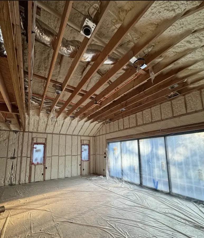 Interior walls and ceiling insulated with spray foam during new construction in Coraopolis